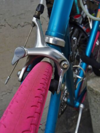 Close-up of a colorful bicycle parked in the city. Urban mobility. environmental footprintの写真素材