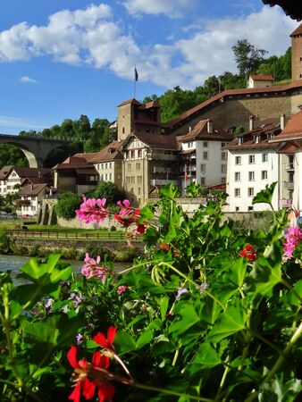View of medieval construction in the lower town and bridge of Fribourg. Towers of the Bern Gate. swiss tourismの写真素材