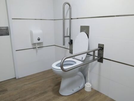 public toilet facility adapted for the disabled. Mandatory regulations for people with motor handicappedの写真素材