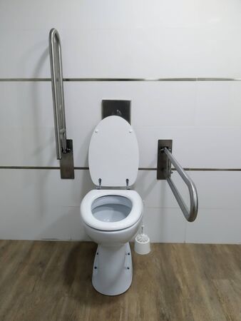 public toilet facility adapted for the disabled. Mandatory regulations for people with motor handicappedの写真素材
