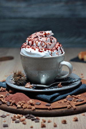 cup of hot chocolate with whipped cream and caramel sauce. image of cafeteria sweet wishesの写真素材