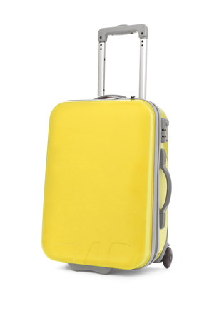 Yellow suitcase on white backgroundの写真素材