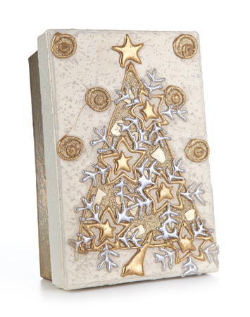 Gold Christmas gift box on white backgroundの写真素材