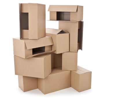 piles of cardboard boxes on a white backgroundの写真素材