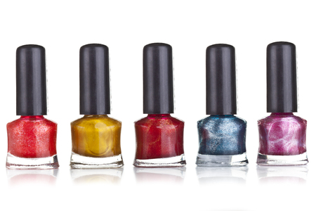 Group of bright nail polishes isolated on whiteの写真素材