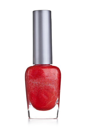 red nail polish bottle on white backgroundの写真素材