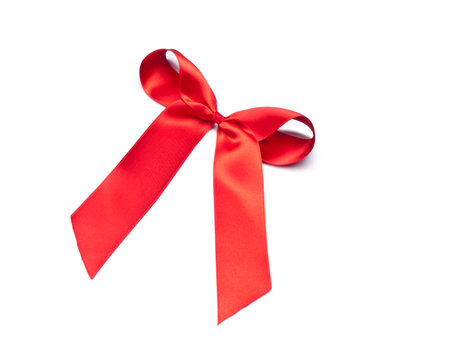 Red ribbon bow isolated on white background. Studio shotの写真素材