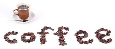 The text of coffee from grains and a cup, isolated on whiteの写真素材