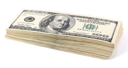 Pile of hundred dollar notes isolated on white