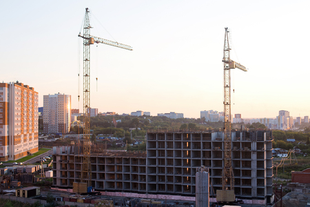 Apartment building in the city in sunriseの写真素材