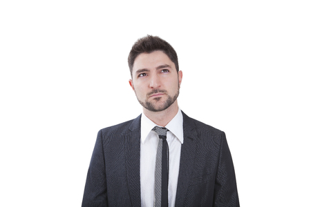 middle-aged caucasian businessman with blue suit thinkingの写真素材