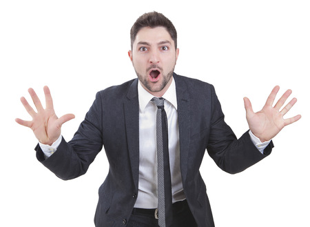 middle-aged surprised elegant businessman with blue suitの写真素材