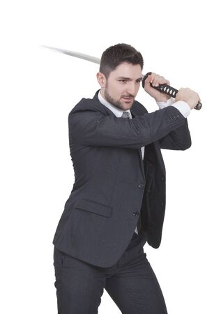 Warrior businessman with black suit and a katana in his handsの写真素材