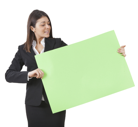 A businesswoman is keeping big green signboardの写真素材