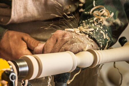 The carpenter at work at the benchの写真素材