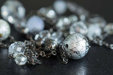 Necklace from a metal and glass beadsの写真素材