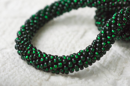 Necklace fragment from green beads close upの写真素材