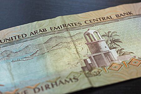 Banknote of the United Arab Emirates in five dirhams close upの写真素材