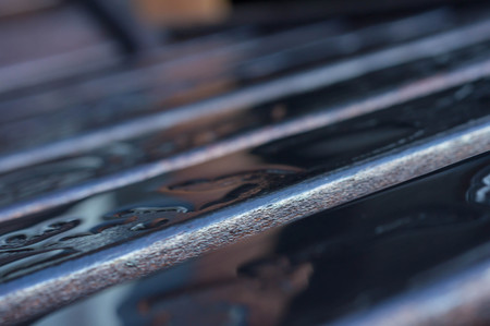 Drops of water on the wooden boards after rainの写真素材