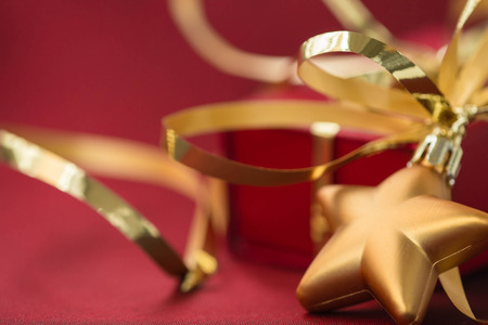 Christmas decoration in the shape of a star and gift boxの写真素材