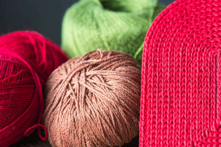 Several skeins of yarn in different colors close upの写真素材