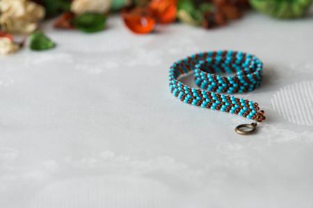 Wattled necklace from beads of turquoise and brown colorの写真素材