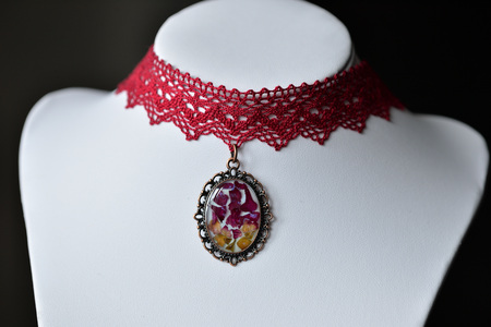 Handmade choker necklace from lace and pendant with natural flowersの写真素材