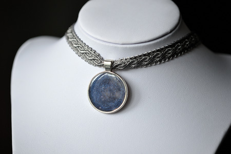 Choker necklace from ribbon and handmade pendant of an epoxy resinの写真素材