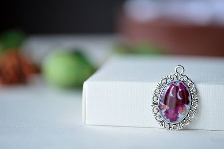 Medallion of rose petals and epoxy resin close upの写真素材