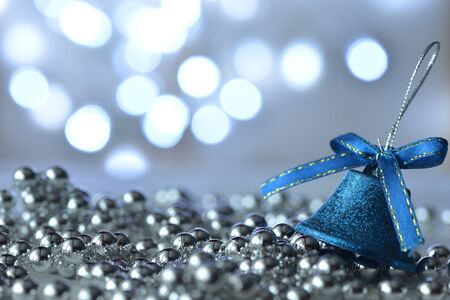 Blue bell and Christmas decorations with bokeh backgroundの写真素材