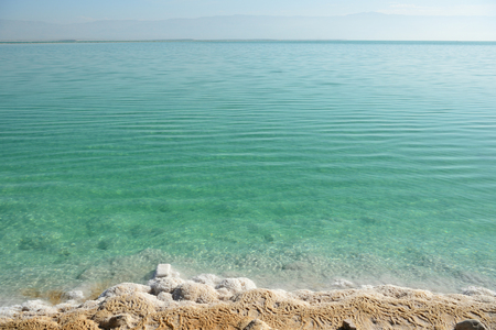The coast of the Dead Sea in the morning on a sunny dayの写真素材
