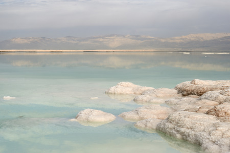 Coast of the Dead Sea in cloudy weatherの写真素材