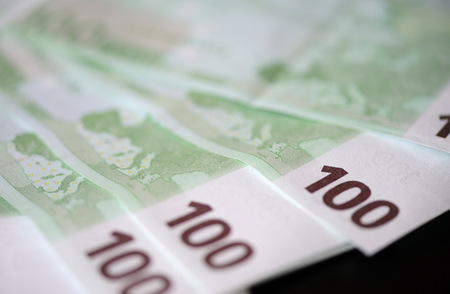 Banknotes in one hundred euros closeupの写真素材