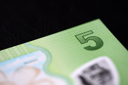 Banknote five Fijian dollars on a dark background close upの写真素材