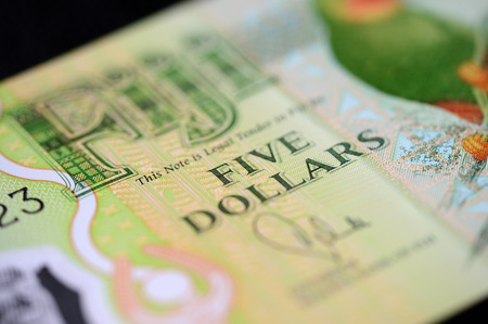 Banknote five Fijian dollars on a dark background close upの写真素材