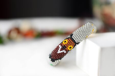 Handmade Beaded Crochet Bracelet with Owl close upの写真素材