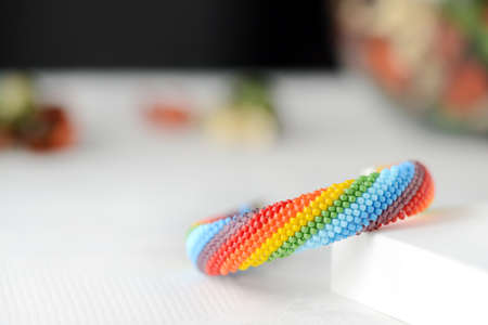 Bead crocheted bracelet of a rainbow colors close upの写真素材