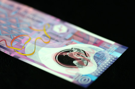 10 Hong Kong dollars on a dark background close upの写真素材