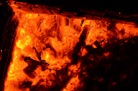 Flame of burning fire close-up as backgroundの写真素材