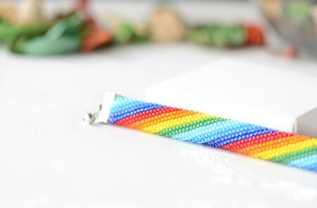 Handmade crocheted bracelet rainbow colors close upの写真素材
