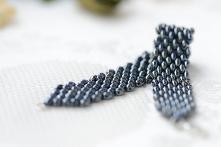 Black beaded bracelet hematite color close upの写真素材