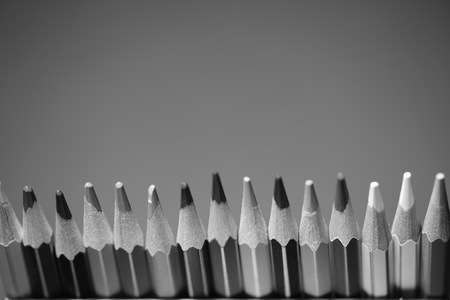 Group of multicolored pencils close up. Black and whiteの写真素材