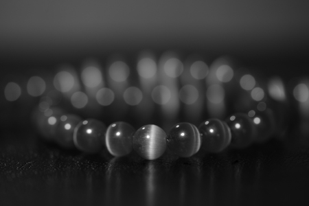 Cat's eye beads necklace close up. Black and whiteの写真素材