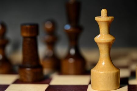 Chess figures on a chessboard close upの写真素材