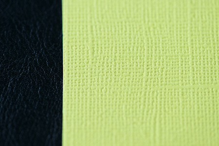 Colorful cardboads on a dark leather background close upの写真素材