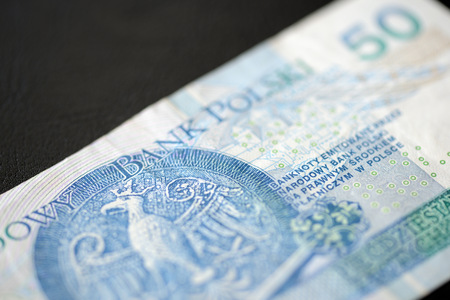 Fifty Polish zlotys on a dark background close upの写真素材
