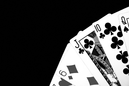 Playing cards on a dark background close up. Black and whiteの写真素材