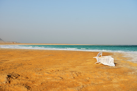 Dead Sea seashore in the evening in cloudy weatherの写真素材