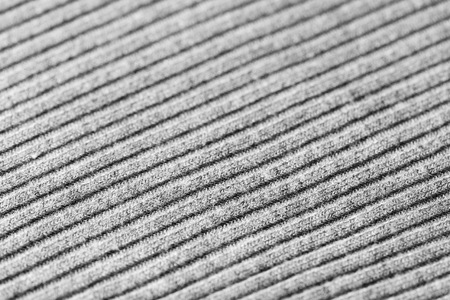 Gray knitwear as a texture and background close upの写真素材