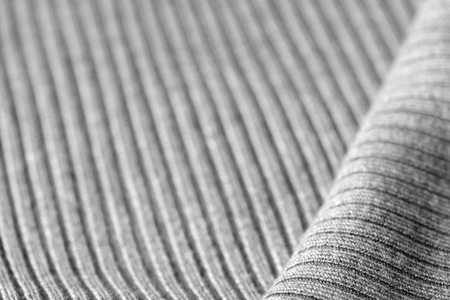 Gray knitwear as a texture and background close upの写真素材